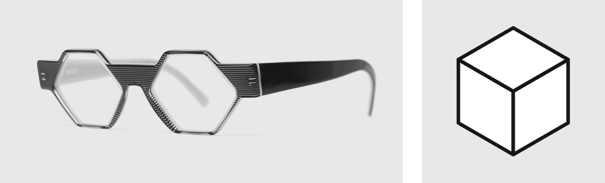 Hexagonal eyeglass frames and a geometric drawing of a cube